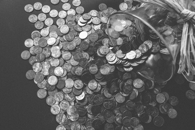 black and white photo of pennies to represent racial wealth gap